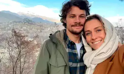 Charlotte Bellis poses with her partner Jim Huylebroek in Kabul, Afghanistan. (AP photo)