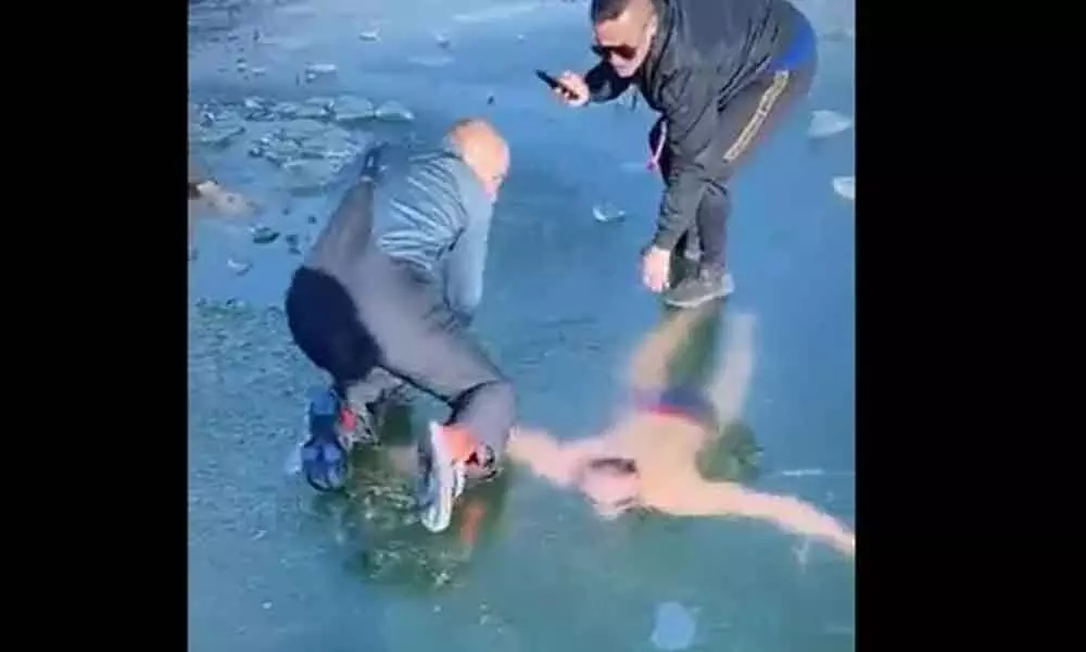 Watch The Trending Video Of A Man Swimming Under The Frozen Lake