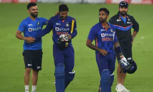 Indias Suryakumar Yadav and Deepak Hooda being greeted by teammates Rohit Sharma and Virat Kohli after winning the first ODI against West Indies, at the Narendra Modi Stadium, in Ahmedabad on Sunday