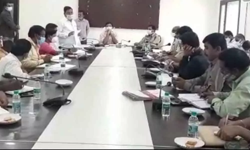 District Collector P Uday Kumar along with SP Manohar and other officails deliberating on the attacks on SCs and STs in Nagarkurnool on Monday