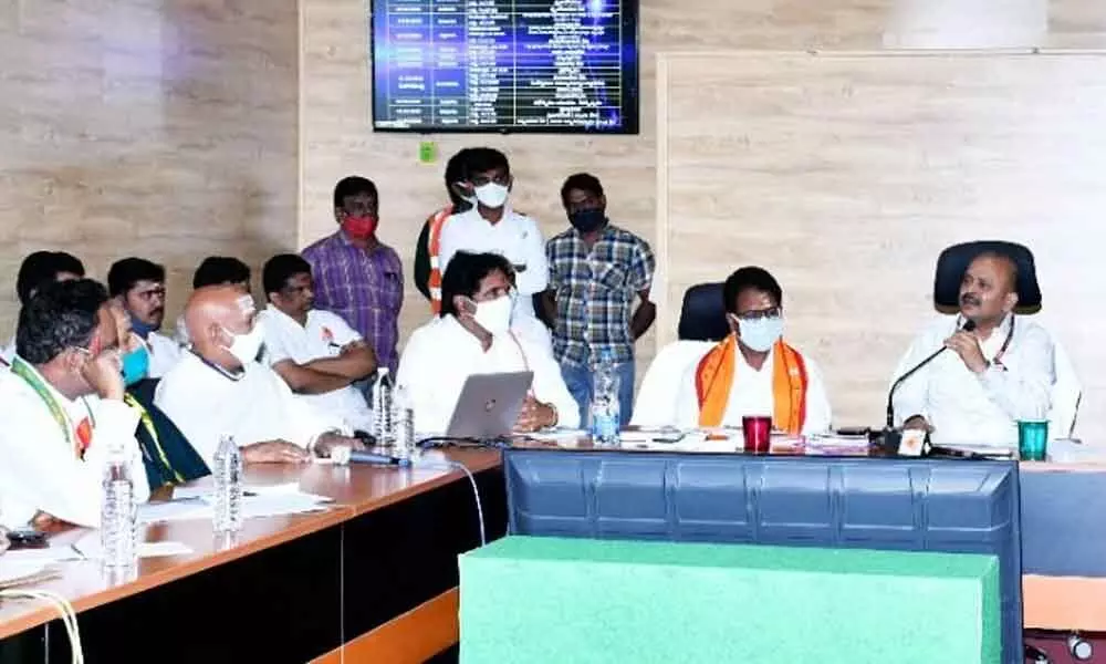 Endowments Commissioner Dr M Hari Jawahar Lal reviewing arrangements for Maha Sivaratri Bhramotsavams in Srisailam on Monday. Executive Officer  S Lavanna and other temple staff are also seen.