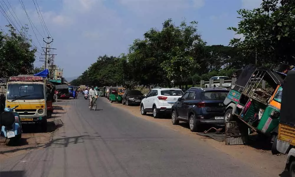 Vehicles parked on service road