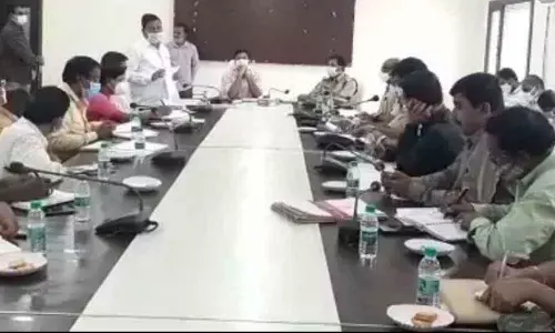District Collector P Uday Kumar along with SP Manohar and other officails deliberating on the attacks on SCs and STs in Nagarkurnool on Monday