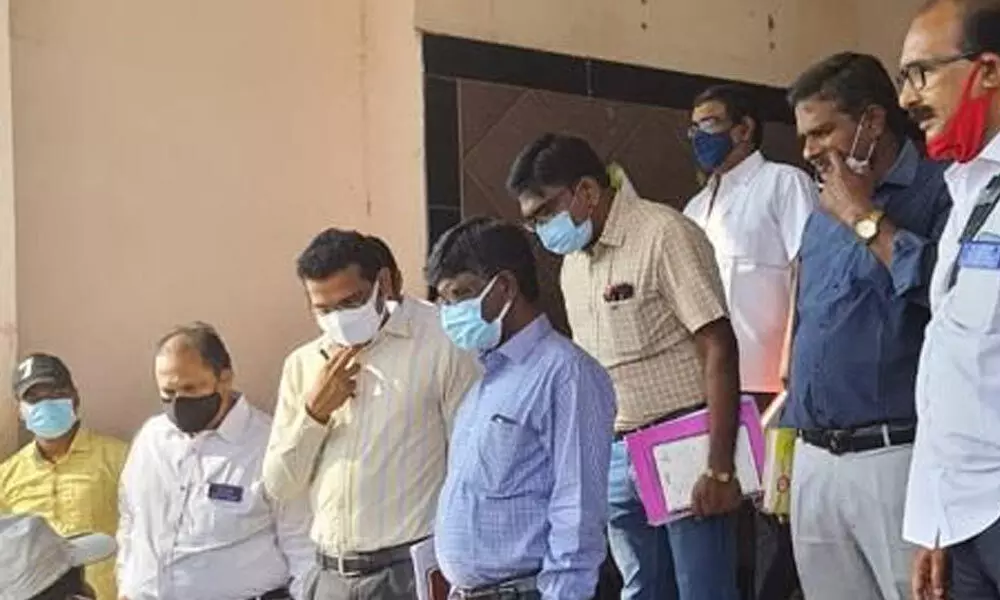 SCR Principal Chief Commercial Manager G John Prasad inspecting port railway station in Kakinada on Tuesday