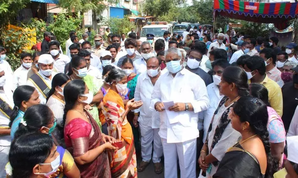 Vijayawada central constituency MLA Malladi Vishnu interacting with people during his visit to the constituency on Tuesday
