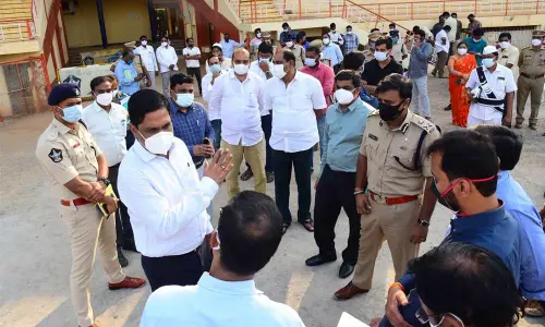 Principal Secretary to AP Government (Transport) MT Krishna Babu discussing about the arrangements for the Union Minister Nitin Gadkari’s visit, at IGMC stadium in Vijayawada on Tuesday