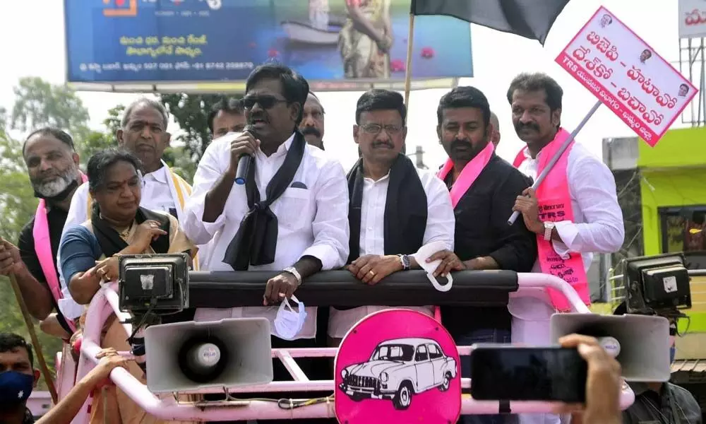 Transport Minister Puvvada Ajay Kumar speaking during the protest rally in Khammam on Wednesday