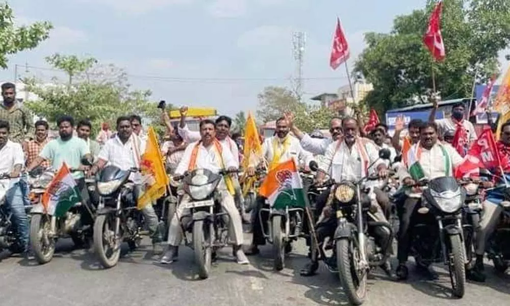 Leaders of political parties conducting bike rally in support of Bhadradri bandh in the temple town on Wednesday