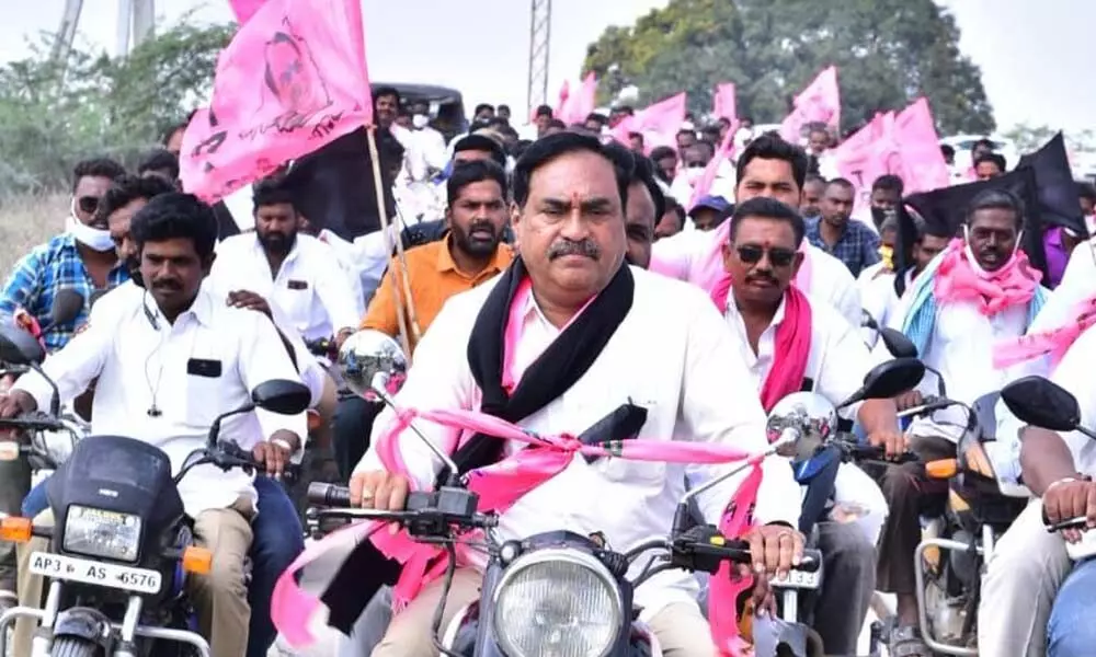 Minister for Panchayat Raj Errabelli Dayakar Rao leading a bike rally in Palakurthy of Jangaon district on Wednesday