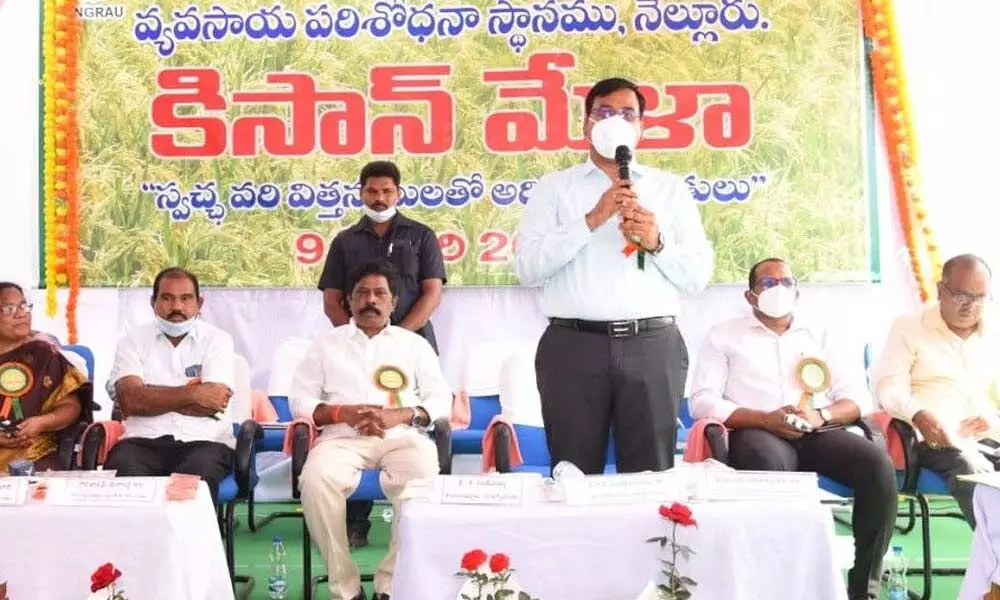 District Collector K V N Chakradhar Babu addressing the Kisan Mela at Agriculture Research Station in Nellore on Wednesday
