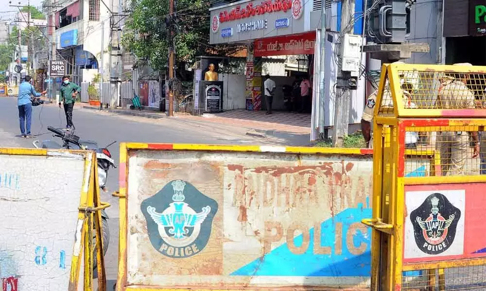 Police set up barricades at AP NGOs Home in Vijayawada on Wednesday, as a precautionary measure amid severe discontent among teachers unions against the AP JAC leaders