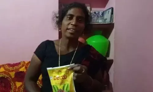 A resident of Bethamcherla showing the palm oil packet.