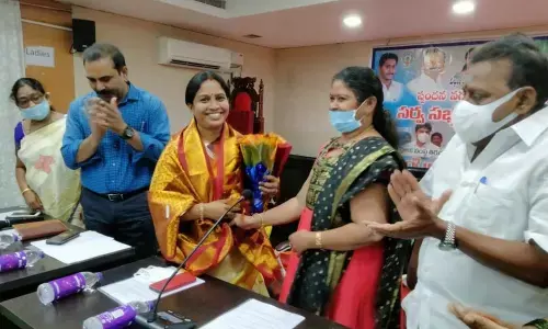 Mayor Dr R Sirisha along with Deputy Mayor Mudra Narayana and Deputy Commissioner Chandramouleeswar Reddy congratulating the newly-elected president for Spandana TLF Prathima Reddy in a meeting organised at Municipal Office in Tirupati on Wednesday.