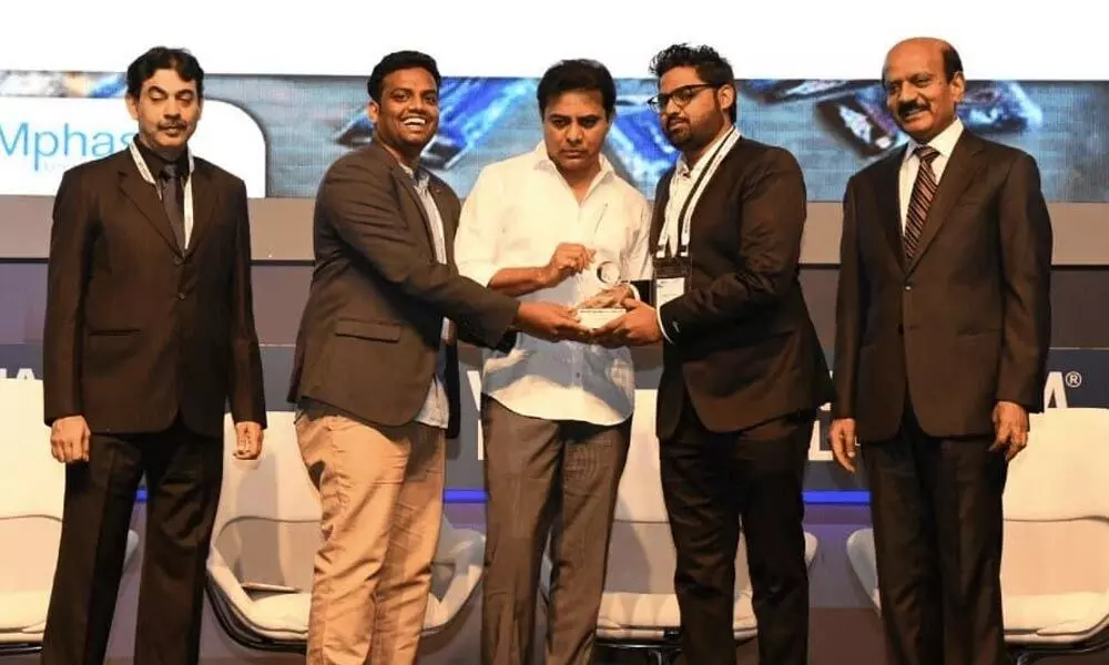 Donatekart founders Sandeep Srivastava Sharma (right) and Anil Kumar Reddy (left) receiving an award from IT minister KTR in Hyderabad (file photo)