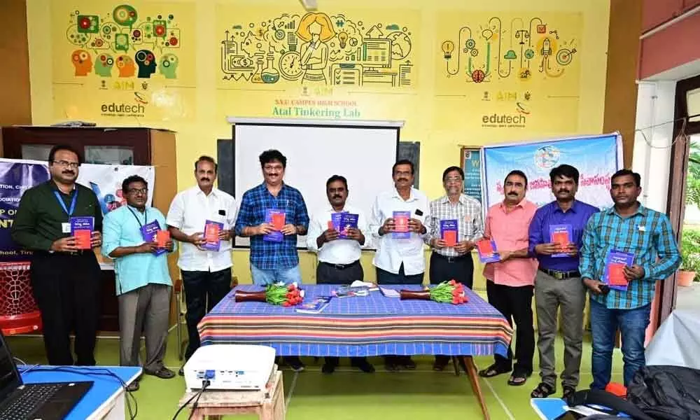 DEO Dr V Sekhar and other dignitaries releasing the story books at the training programme in Tirupati on Thursday