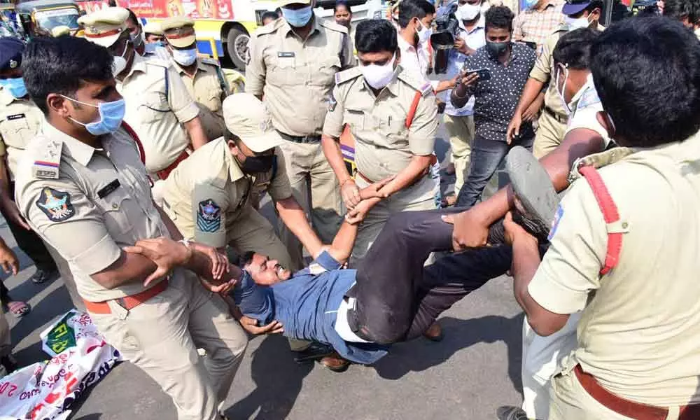 Police arresting student unions leaders, who staged a protest at Lenin Centre in Vijayawada on Thursday 	Photo: Ch Venkata Mastan