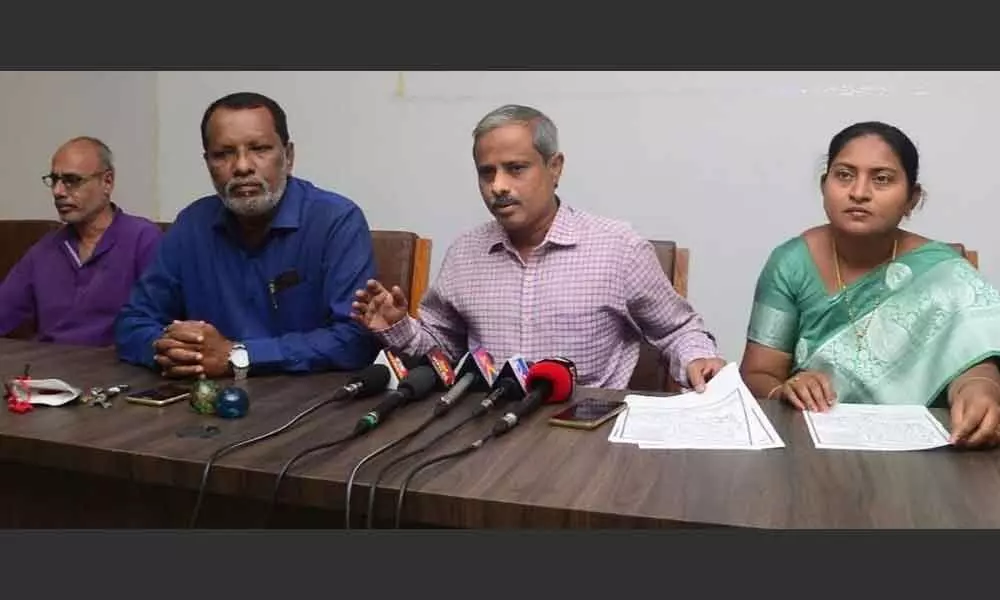Rayalaseema Intellectuals Forum leaders addressing media on the creation of 10 districts in Rayalaseema region, in Tirupati on Thursday