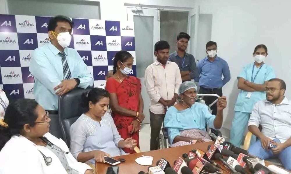 Snake catcher Bhaskar Naidu speaking to media at Amara Hospital on Thursday.