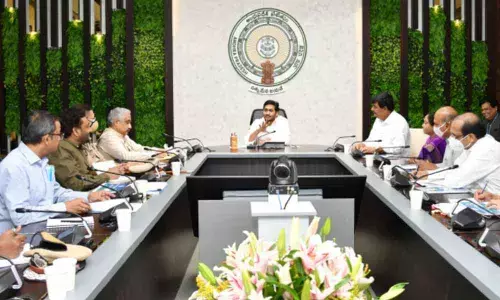 Chief Minister Y S Jagan Mohan Reddy reviews reorganisation of districts at his camp office in Tadepalli on Thursday