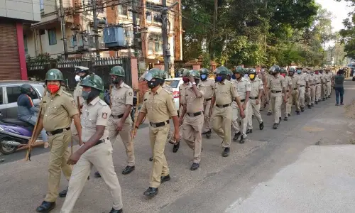 Hijab row: Police hold flag march in Udupi