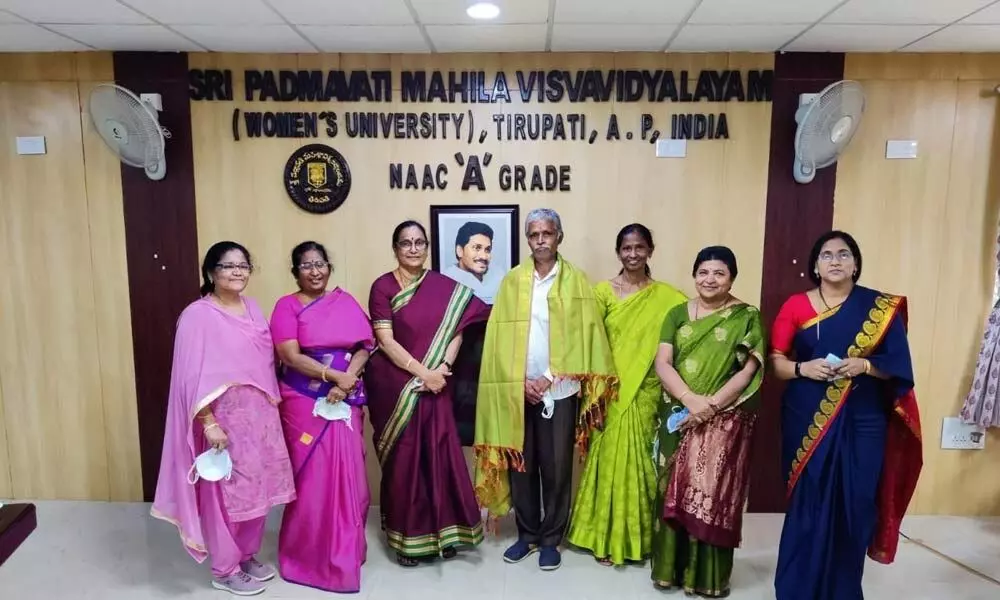 SPMVV V-C Prof D Jamuna, Registrar Prof D M Mamatha and faculty of Sericulture department with WORD general secretary Dr G Gangadhara in Tirupati on Saturday