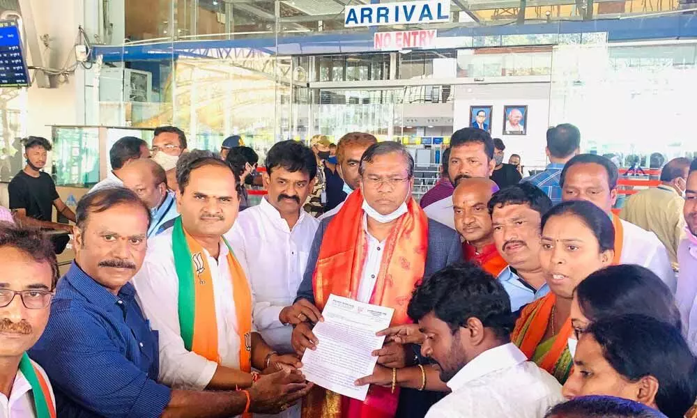 BJP leaders along with other officials handing over a petition to Union Minister for Rural Development and Steel Faggan Singh Kulaste in Visakhapatnam on Saturday