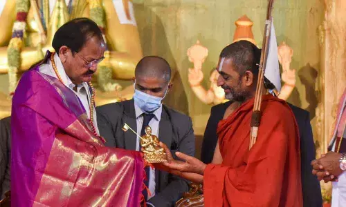 Chinna Jeeyar Swamy presenting a memento to Vice-President  M Venkaiah Naidu at Muchintal on Saturday
