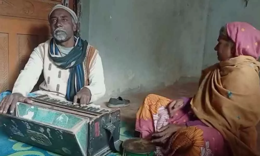 Watch The Trending Video Of An Elderly Couple Singing Song Together With Harmonium And Dafli