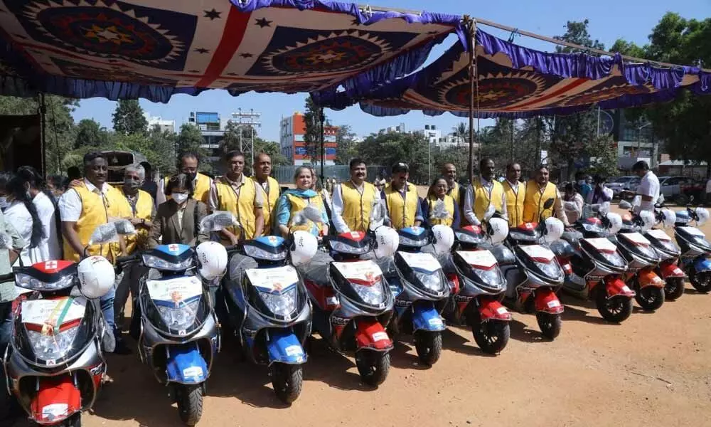 UPHC receives 12 ‘e-Sanjeevini’ electric scooters as donation