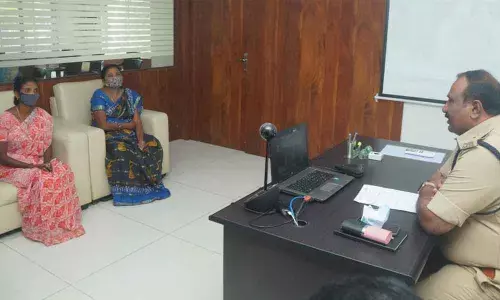 Additional Superintendent of Police K Kumar receiving petitions from people at Spandana programme in Kakinada on Monday