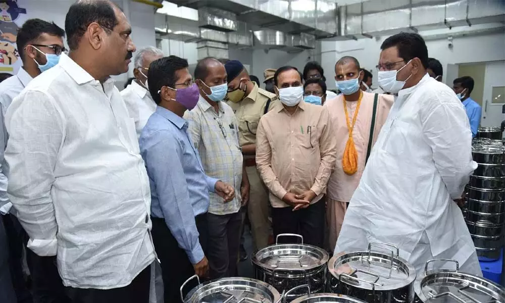 District in-charge Minister Cherakuvada Sri Ranganadha Raju, MLA Alla Rama Krishna Reddy and Joint Collector AS Dinesh Kumar inspecting Akshaya Patra modern cooking room at Atmakuru on Wednesday