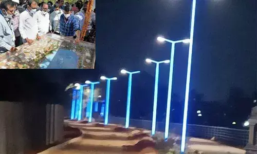 Commissioner P S Girisha explaining the proposed development project of Vinayaka Sagar to MLA Bhumana Karunakar Reddy at the time of laying foundation stone.  (file photo)