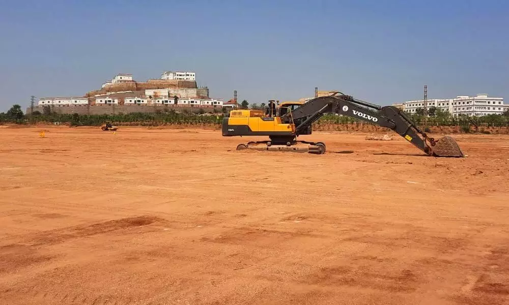 JCB at idle state at Yaga  site in Yadagirigutta