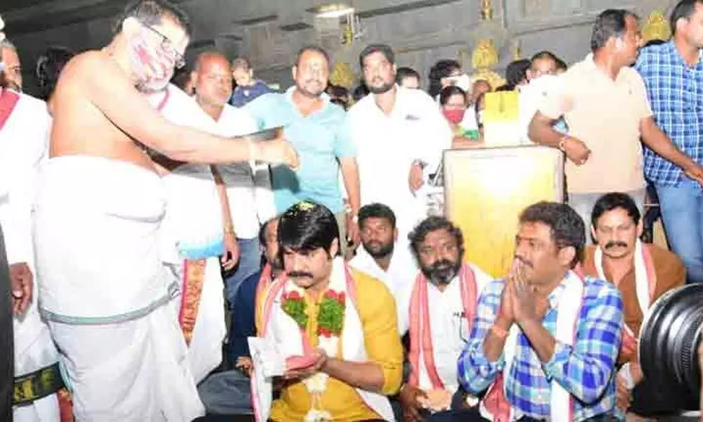 Priests giving blessings to actor Srikanth and other film actors at Yadadri on Sunday