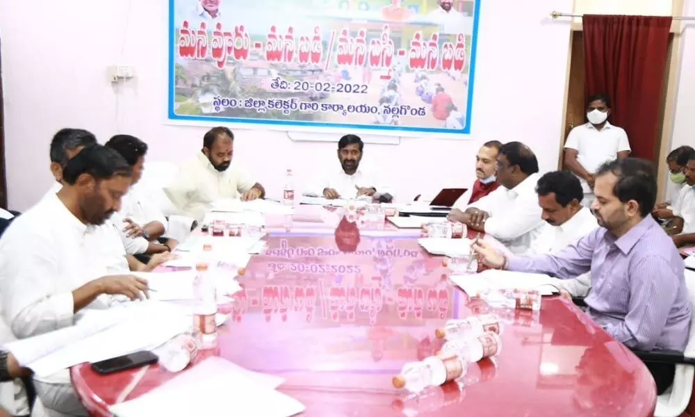 Energy Minister Jagadish Reddy addressing peoples representatives and officials at a review meeting at the Collectorate in Nalgonda on Sunday