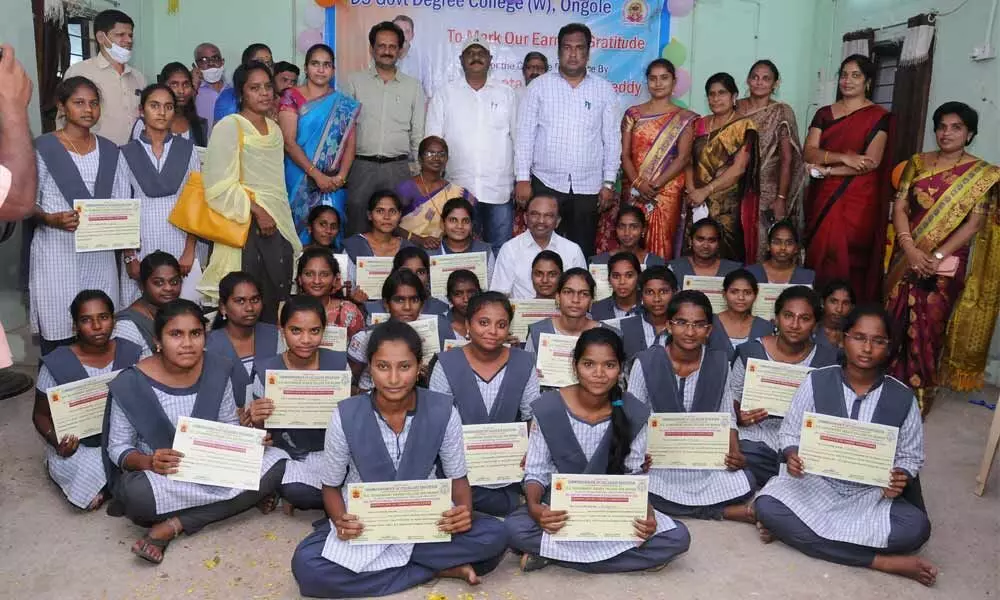 MP Magunta Srinivasulu Reddy along with students and staff at DS Government Degree College for Women in Ongole on Sunday