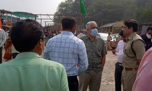 Chief Secretary Dr Sameer Sharma interacting with District Collector Chevuri Hari Kiran and police personnel at Devipatnam on Sunday