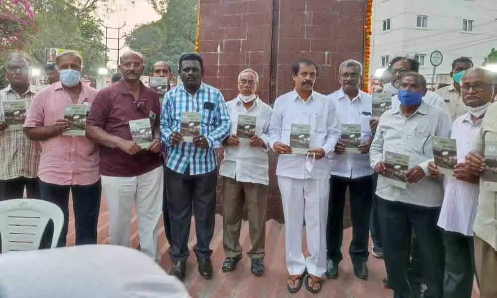 Left leaders P Madhu and K Ramakrishna, Ch Babu Rao, Prajasakthi Book House Editor S Venkatrao releasing a book Ammakaniki Prajala Nammakam in Vijayawada on Monday