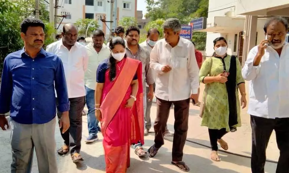 Mayor Dr R Sirisha along with corporators inspecting Green Park apartments at 12th division in Tirupati on Monday