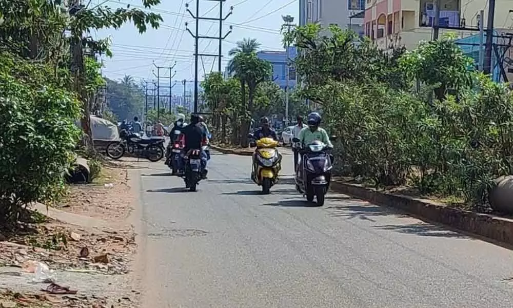 Commuters using the road against one-way at 80-ft bypass road near Bhaji junction in Visakhapatnam