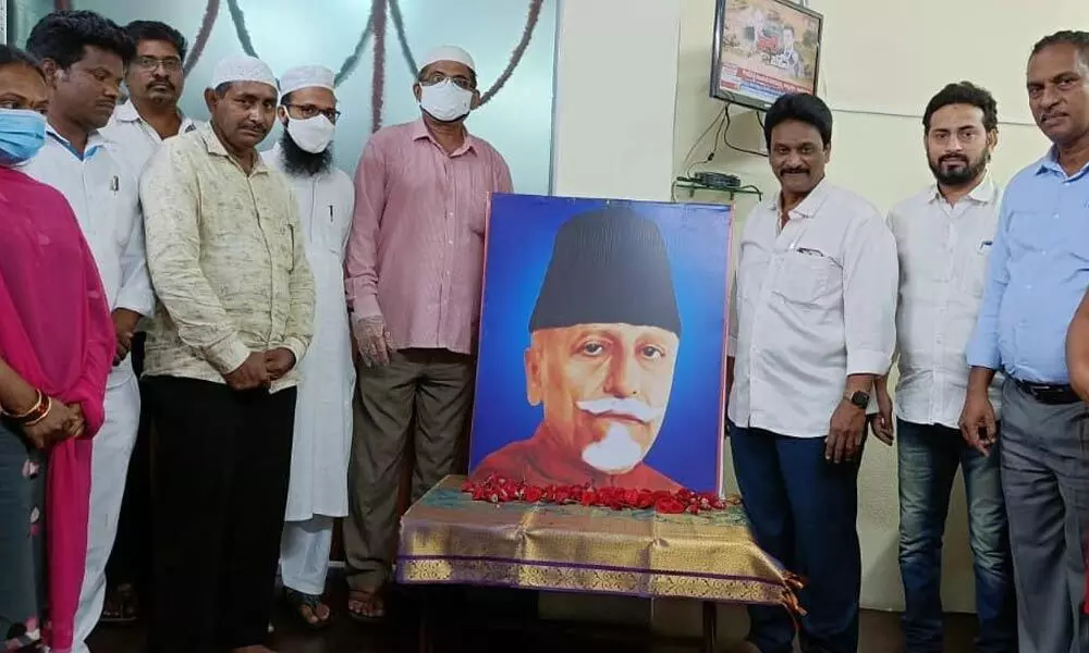 AP Minorities Finance Corporation Chairman Shaik Asif paying tributes to first Education Minister of India Moulana Abul Kalam Azad on his death anniversary in Vijayawada on Tuesday