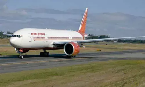 AI flight brings 240 from Ukraine