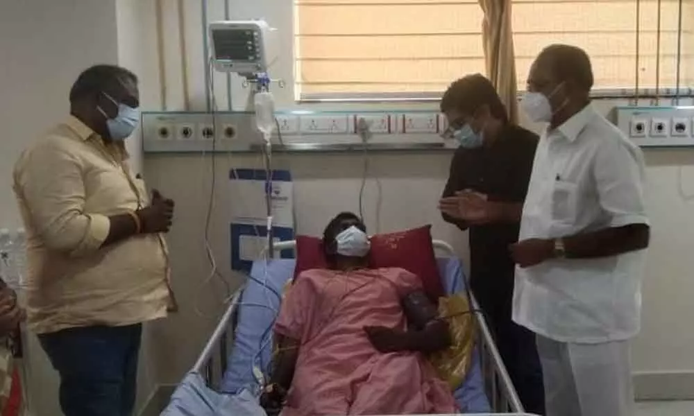 JSP leaders interacting with victim in Visakhapatnam on Thursday