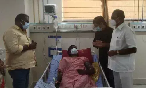 JSP leaders interacting with victim in Visakhapatnam on Thursday