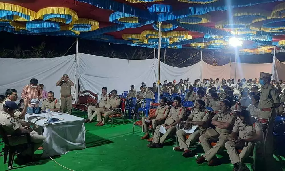 Superintendent of Police Ch Sudheer Kumar Reddy conducting a meeting with police over the bandobast arrangements for Sivaratri Brahmotsavams in Srisailam on Friday