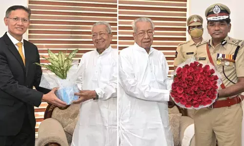 APPSC chairman Gautam Sawang and DGP KV Rajendranath Reddy with Governor Biswa Bhusan Harichandan at Raj Bhavan in Vijayawada on Friday