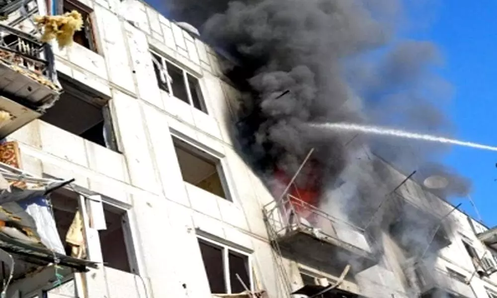 High-rise apartment in Kiev hit by a devastating missile