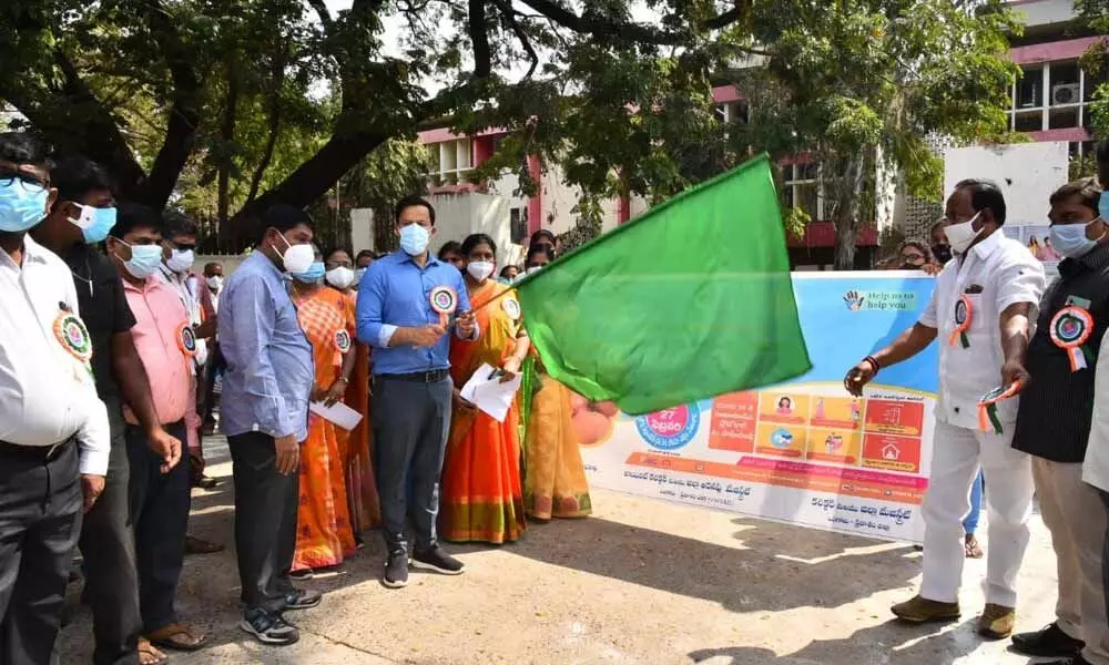 Collector Pravin Kumar flagging off pulse polio awareness rally in Ongole on Saturday