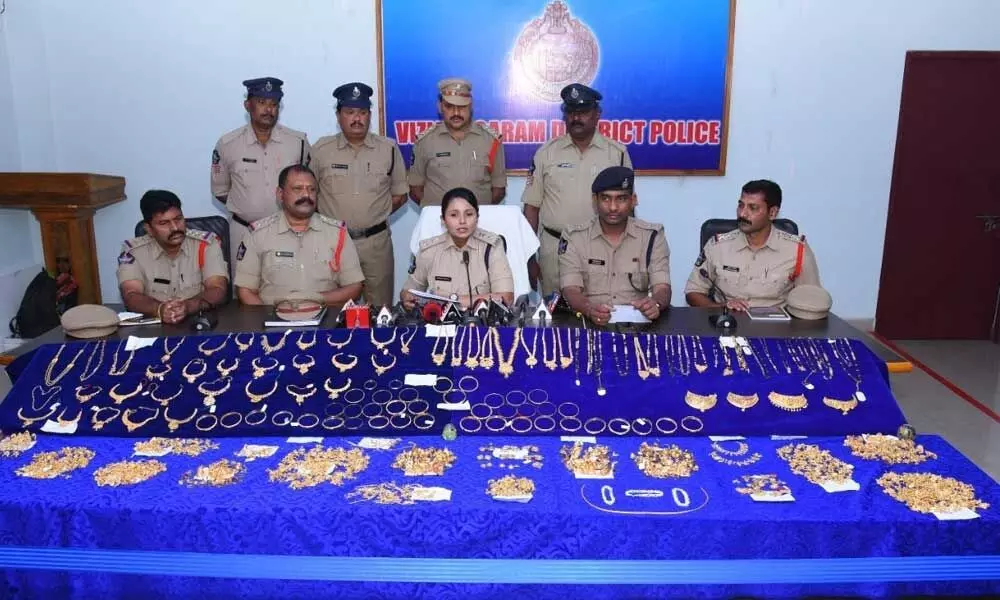 SP M Deepika and other officers with the recovered ornaments in Vizianagaram on Saturday