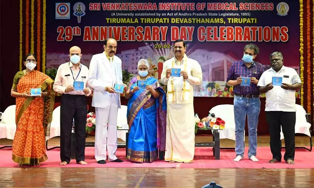 SVIMS Director Dr B Vengamma, TTD Board member P Ashok Kumar, Dr A Muruganathan, Dr Alladi Mohan and others releasing the annual report at the anniversary day celebrations in Tirupati on Saturday
